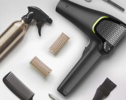 black volo hairdryer with other hairstyling products